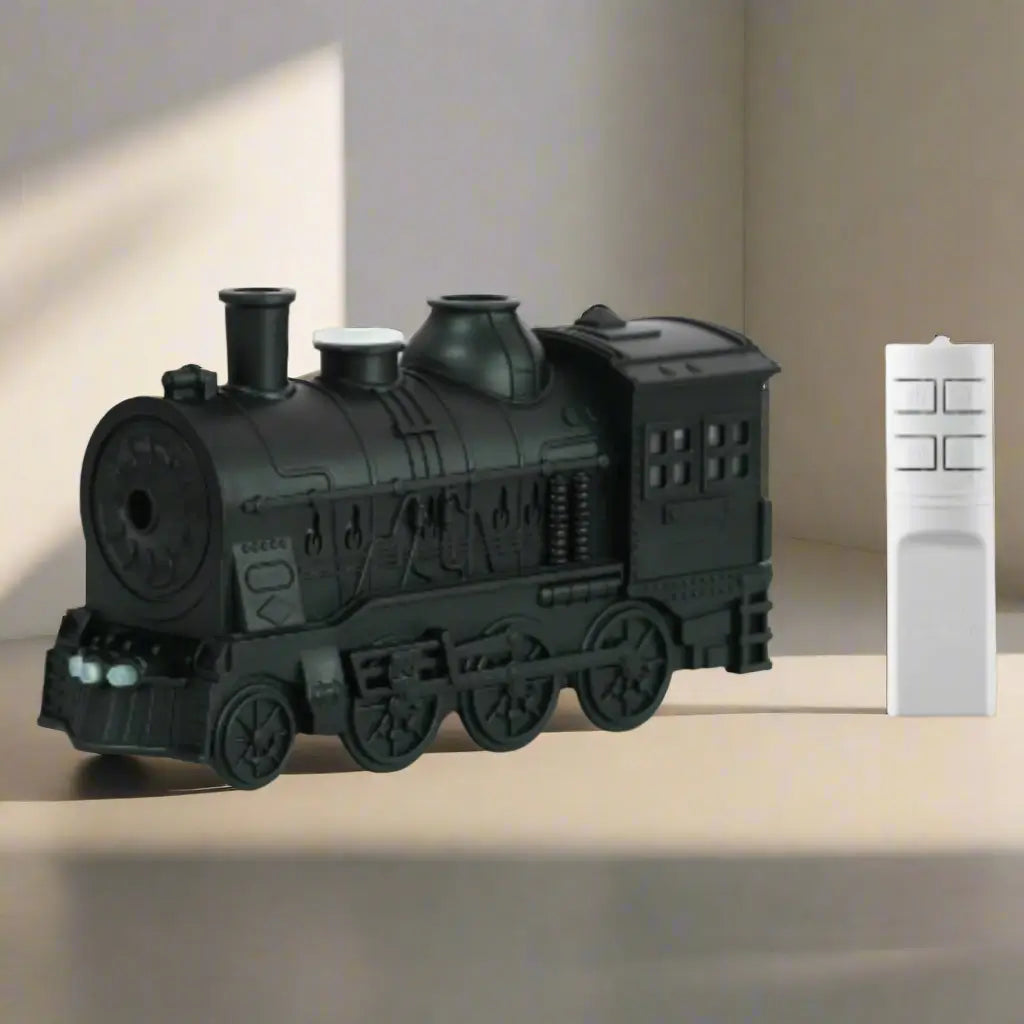 JLD Locomotive Diffuser emitting scented mist with steam puff effect and ambient lightingâdesigned like a classic train engine for stylish aromatherapy and cozy decor