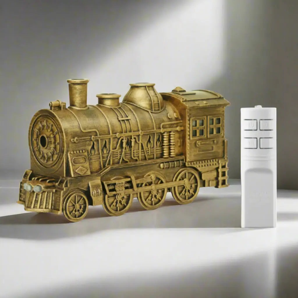 JLD Locomotive Diffuser emitting scented mist with steam puff effect and ambient lightingâdesigned like a classic train engine for stylish aromatherapy and cozy decor