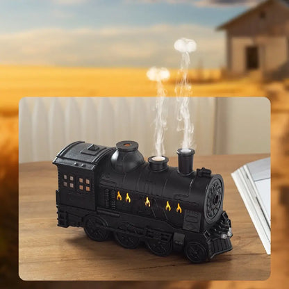 JLD Locomotive Diffuser emitting scented mist with steam puff effect and ambient lighting—designed like a classic train engine for stylish aromatherapy and cozy decor