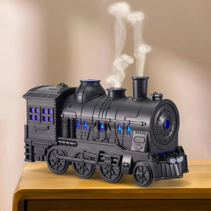 JLD Locomotive Diffuser emitting scented mist with steam puff effect and ambient lighting—designed like a classic train engine for stylish aromatherapy and cozy decor