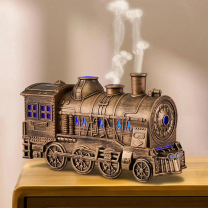 JLD Locomotive Diffuser emitting scented mist with steam puff effect and ambient lighting—designed like a classic train engine for stylish aromatherapy and cozy decor