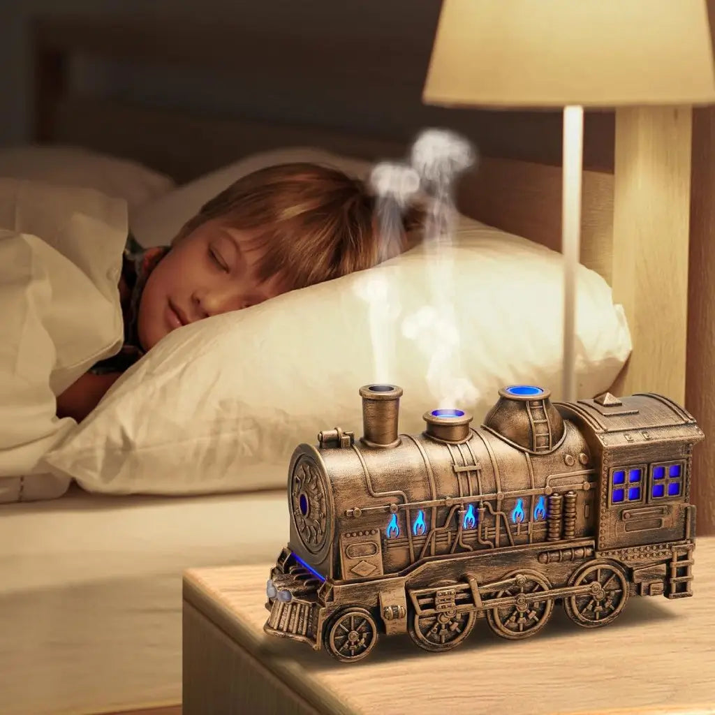 JLD Locomotive Diffuser emitting scented mist with steam puff effect and ambient lighting—designed like a classic train engine for stylish aromatherapy and cozy decor