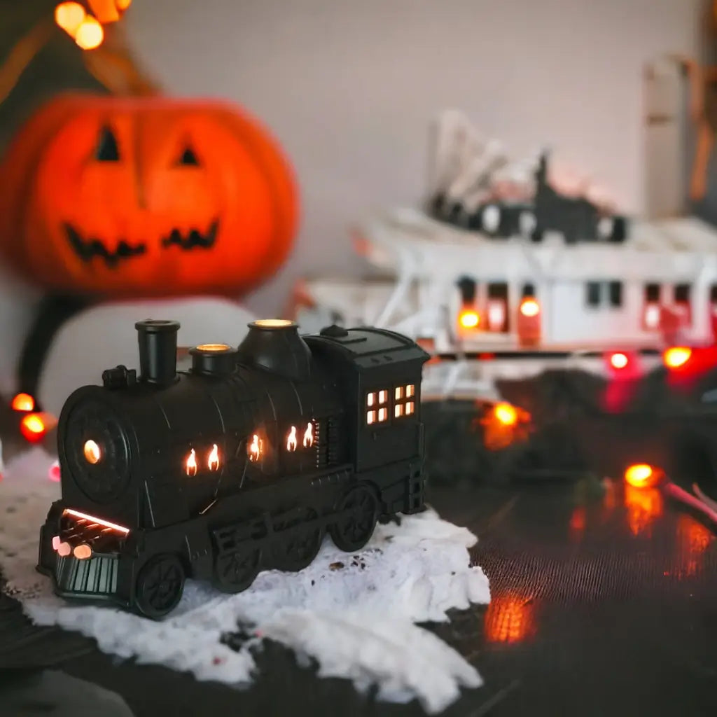 JLD Locomotive Diffuser emitting scented mist with steam puff effect and ambient lighting—designed like a classic train engine for stylish aromatherapy and cozy decor