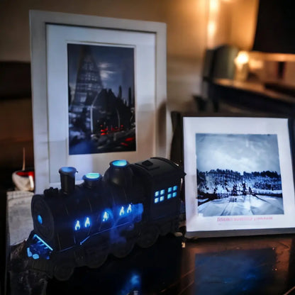 JLD Locomotive Diffuser emitting scented mist with steam puff effect and ambient lighting—designed like a classic train engine for stylish aromatherapy and cozy decor