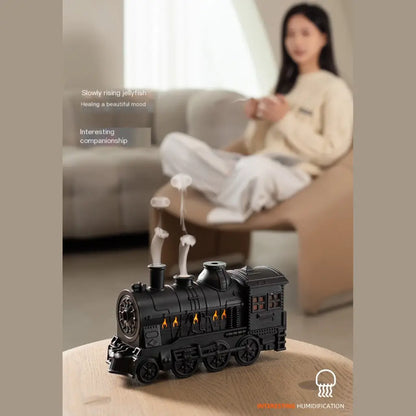 JLD Locomotive Diffuser emitting scented mist with steam puff effect and ambient lighting—designed like a classic train engine for stylish aromatherapy and cozy decor