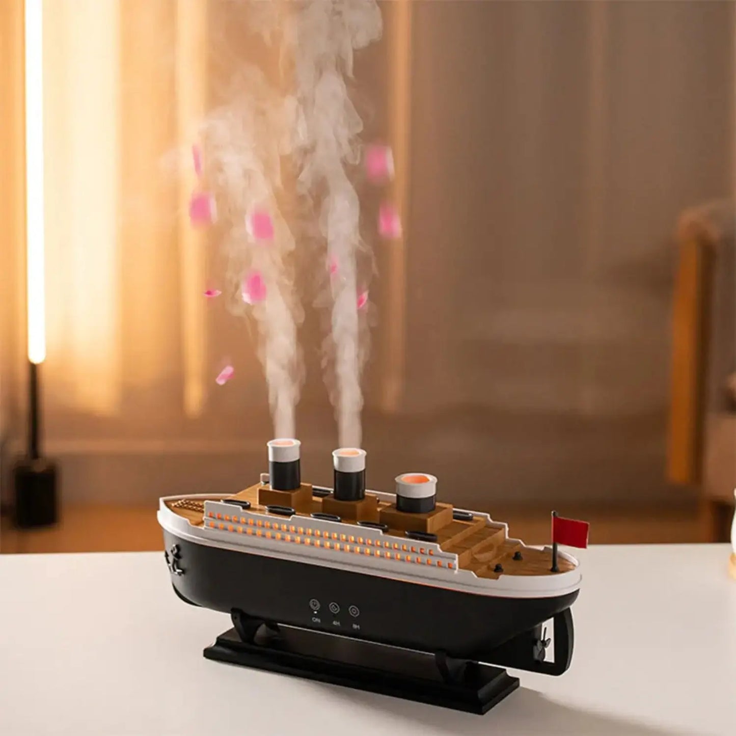 JLD Titanic Ship Diffuser releasing mist through steam chimneys with glowing LED lights—an elegant aromatherapy device combining classic design with modern wellness