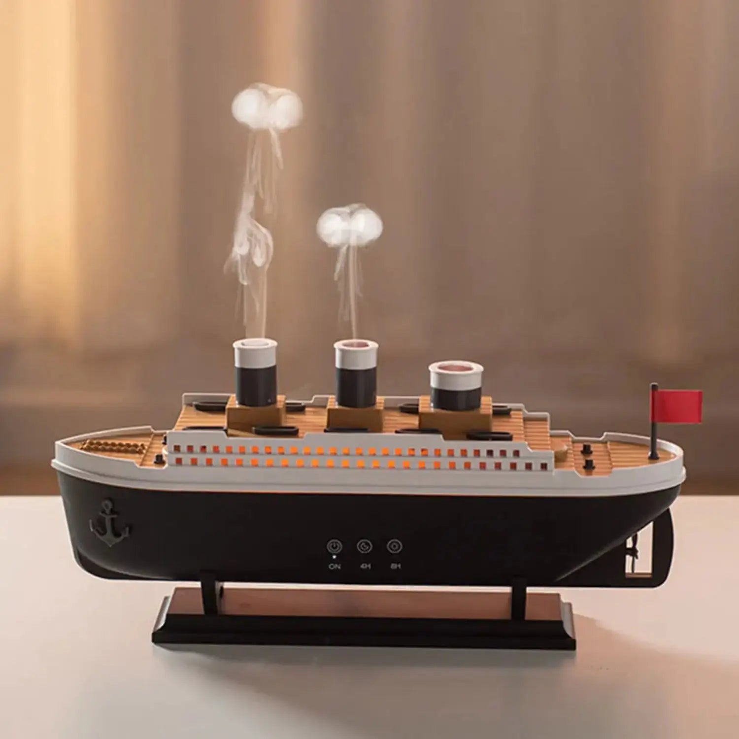 JLD Titanic Ship Diffuser releasing mist through steam chimneys with glowing LED lights—an elegant aromatherapy device combining classic design with modern wellness