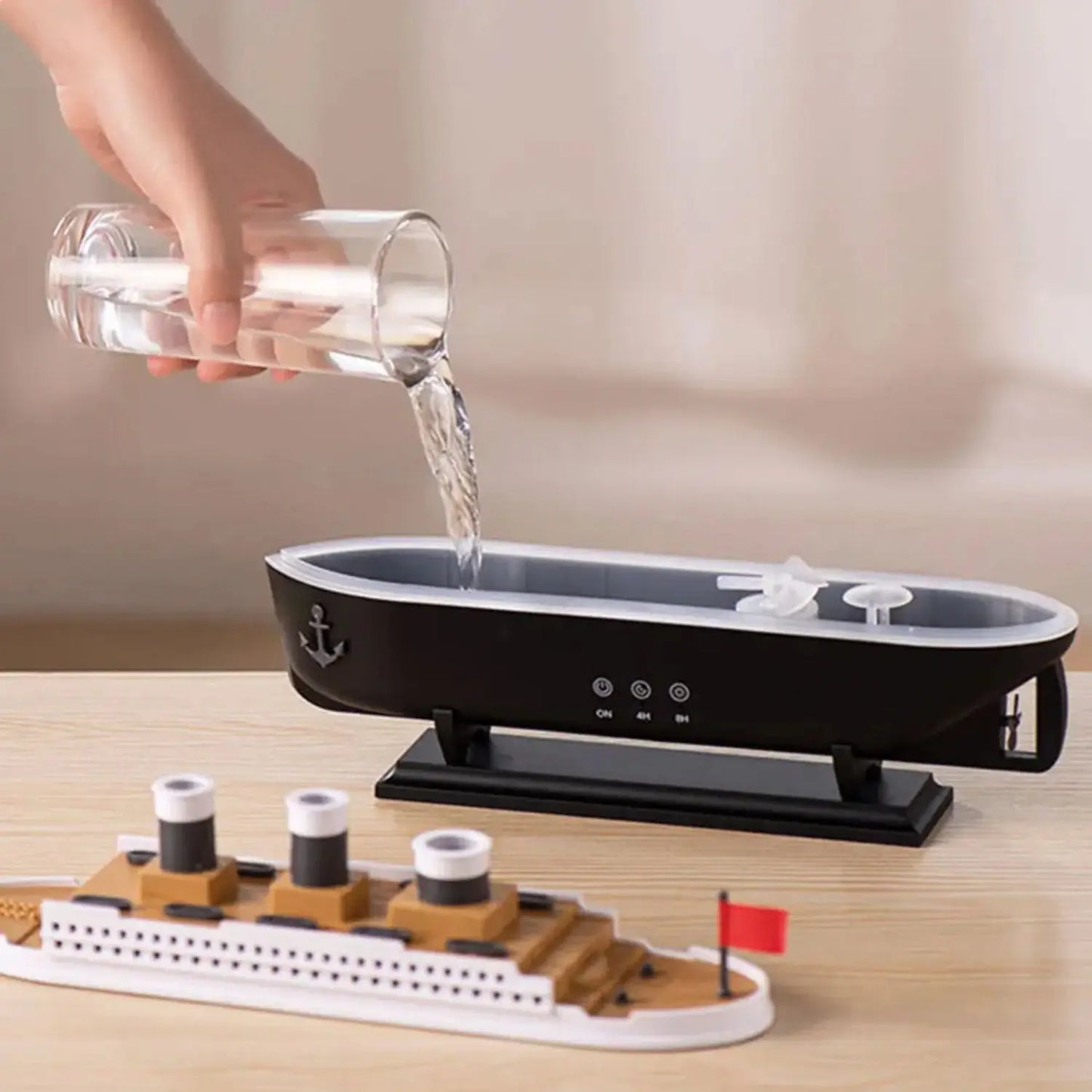 JLD Titanic Ship Diffuser releasing mist through steam chimneys with glowing LED lights—an elegant aromatherapy device combining classic design with modern wellness