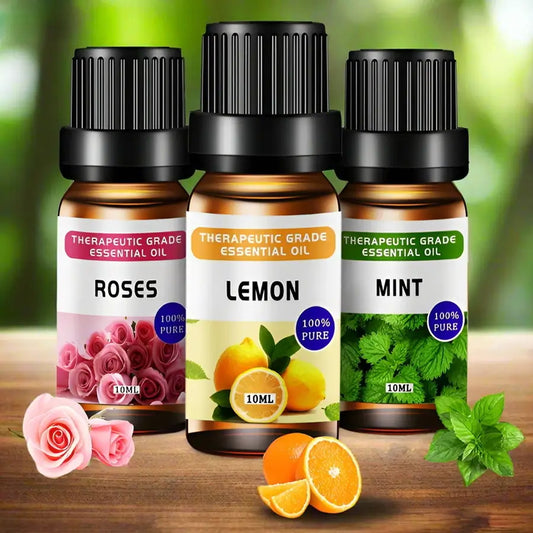 Aromatherapy essential oils in elegant glass bottles, designed for diffusers and humidifiers, releasing soothing, natural fragrances for relaxation and stress relief.